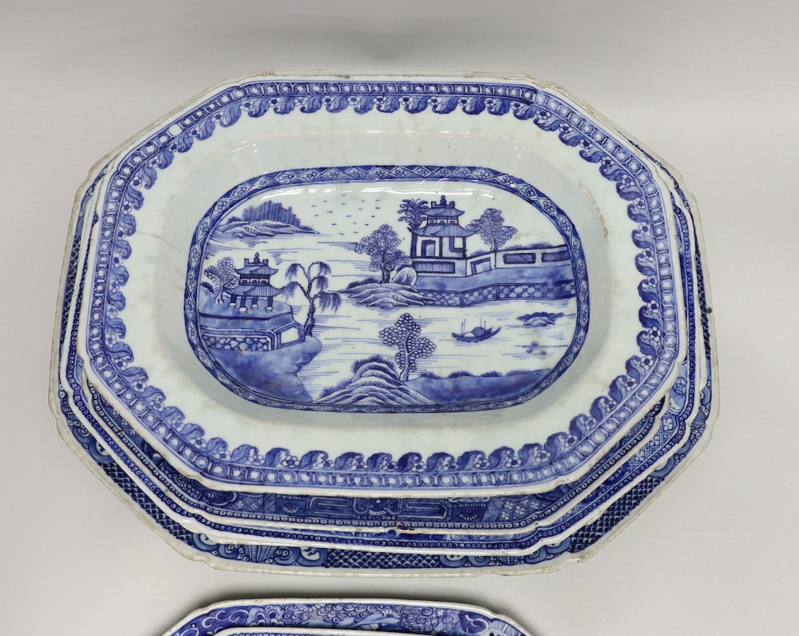 Seven late 18th century Chinese Export blue and white meat dishes, Ranging from 28 to 43. 5 cm wide